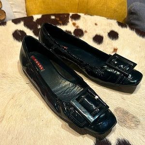 Prada Authentic Black leather closed toe flats. Size 7 good condition.